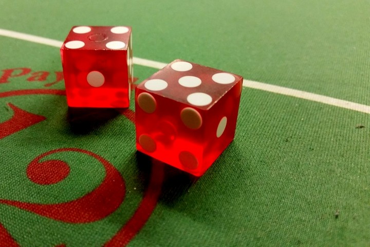 Advantage Play in Craps: Dice Sliding vs. Dice Control